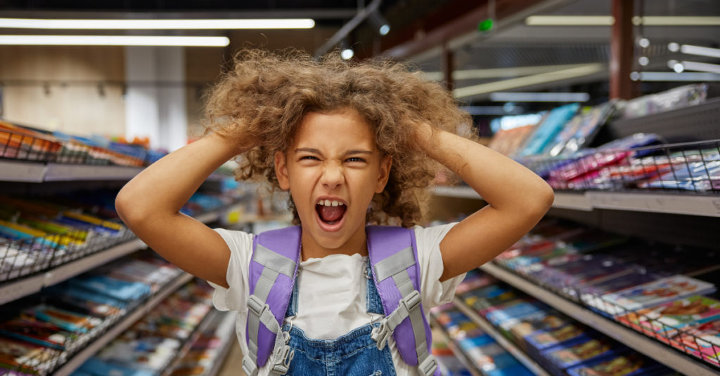 Frustrated girl in a school supplies store trying to choose the right budget school supplies